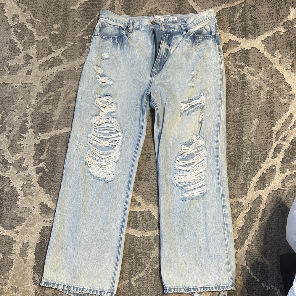Buckle Light Blue Distressed Flare Jeans